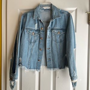Distressed denim jacket